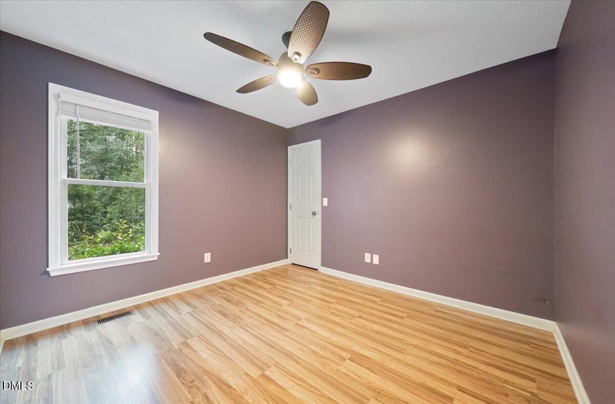 5216 Relay Way Raleigh, NC 27603 - Photo 15 of 27 a view of a room with a ceiling fan