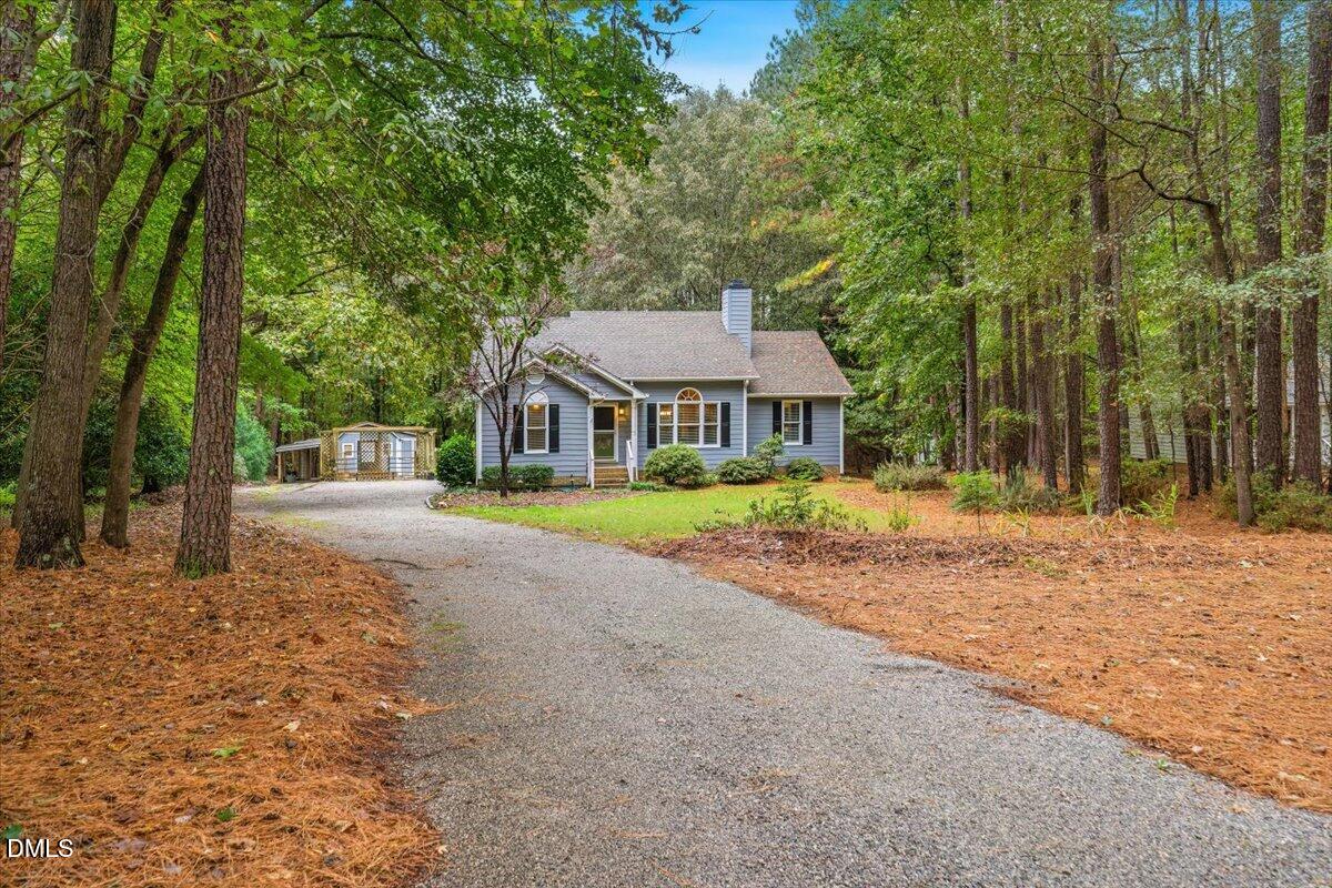 5216 Relay Way Raleigh, NC 27603 - Photo 2 of 27 a house with trees in front of it