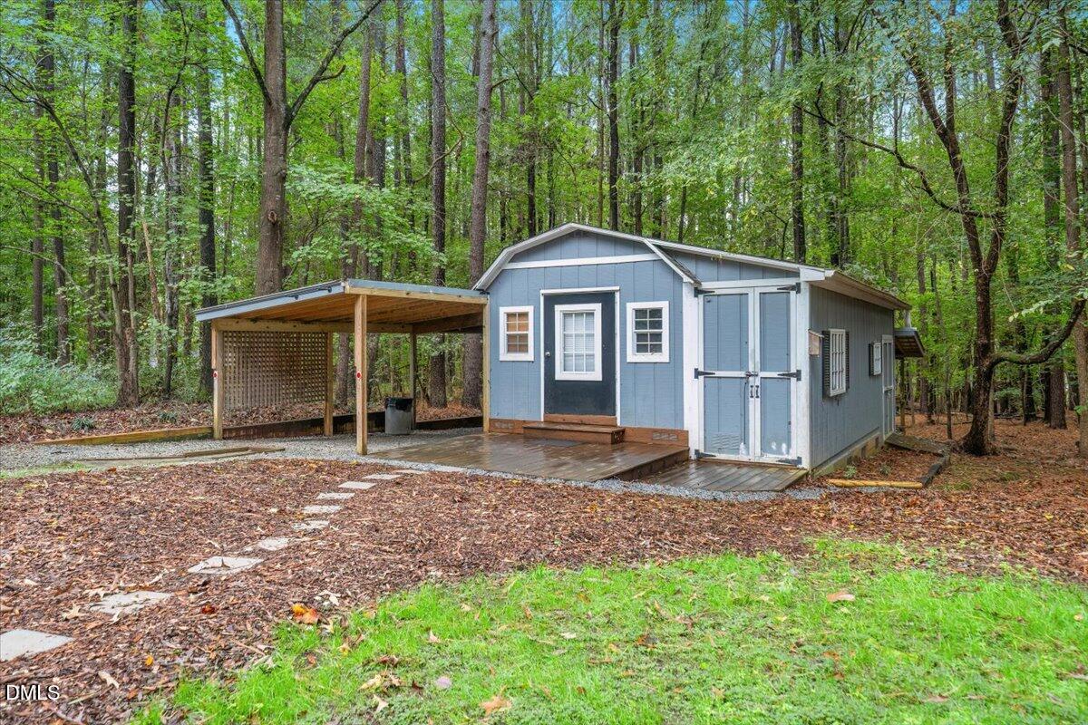 5216 Relay Way Raleigh, NC 27603 - Photo 22 of 27 a view of a house with a yard