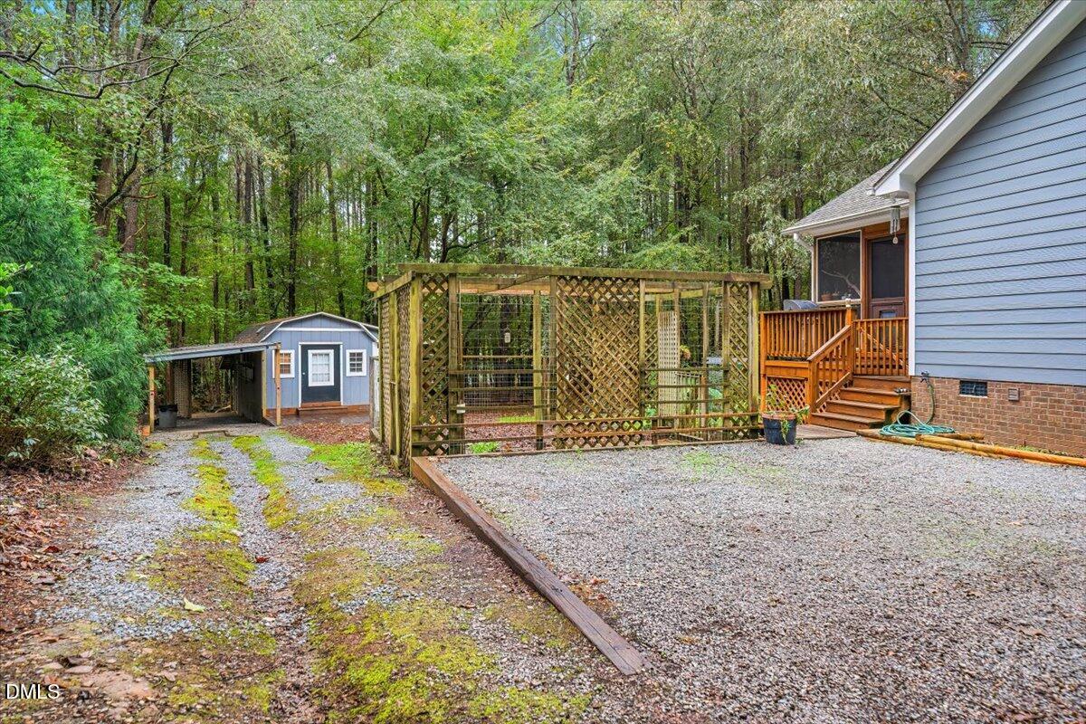 5216 Relay Way Raleigh, NC 27603 - Photo 23 of 27 a view of a house with backyard and sitting area