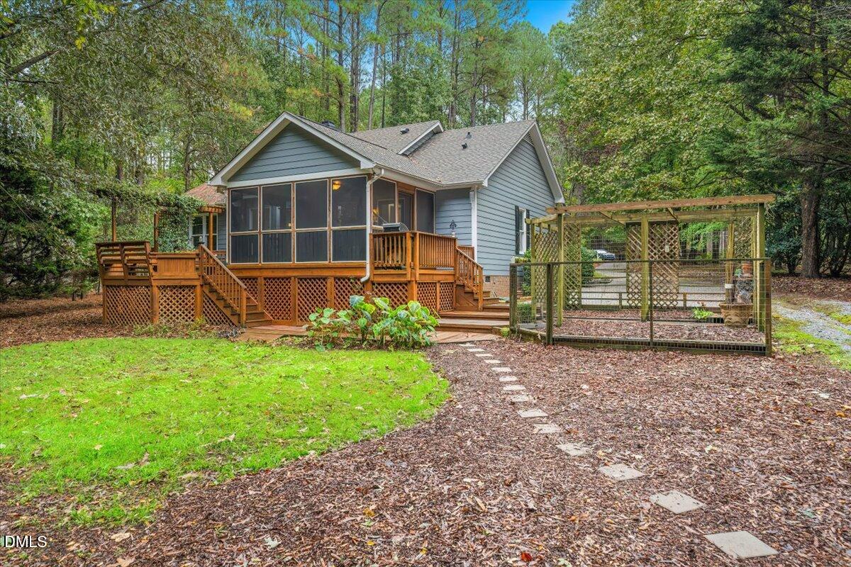 5216 Relay Way Raleigh, NC 27603 - Photo 26 of 27 a front view of a house with garden