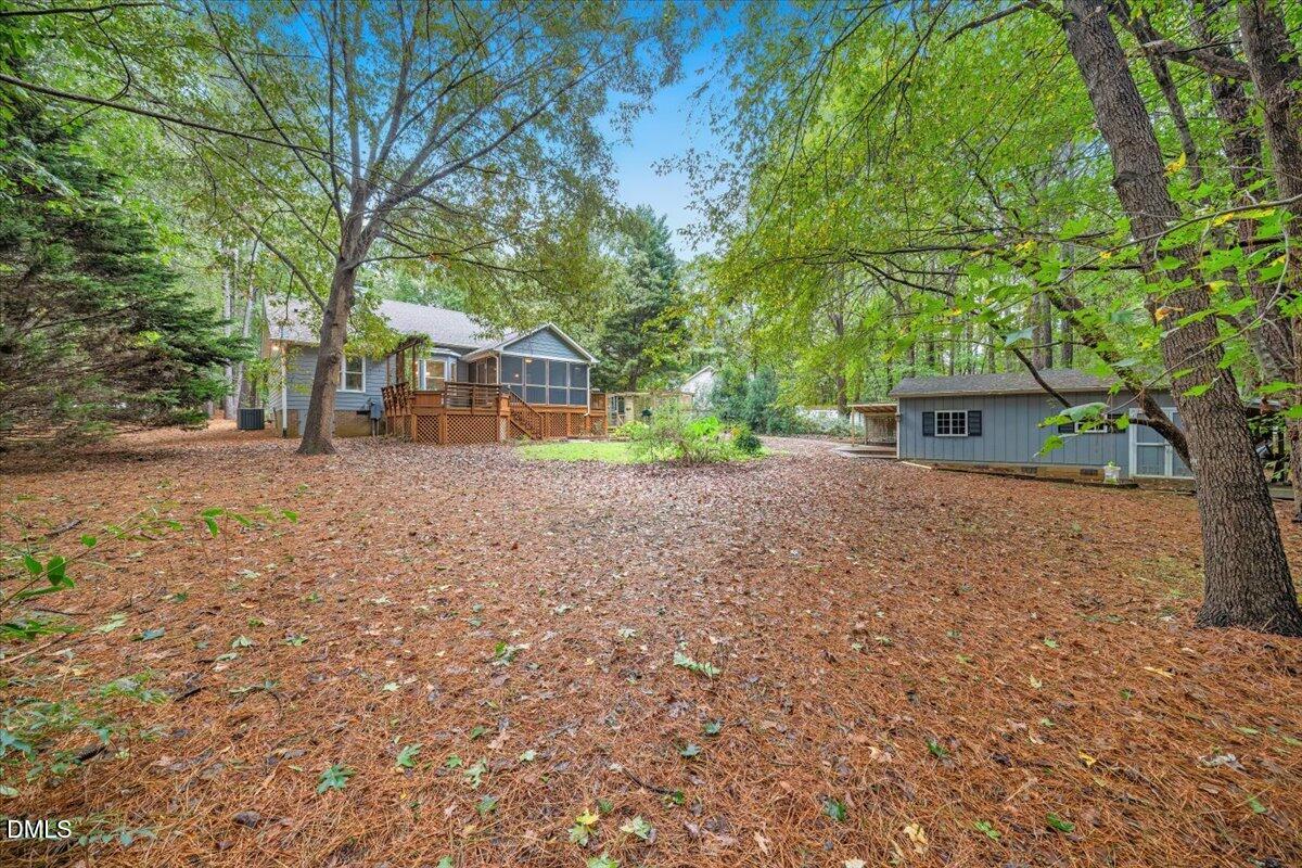 5216 Relay Way Raleigh, NC 27603 - Photo 27 of 27 a front view of a house with a yard and trees
