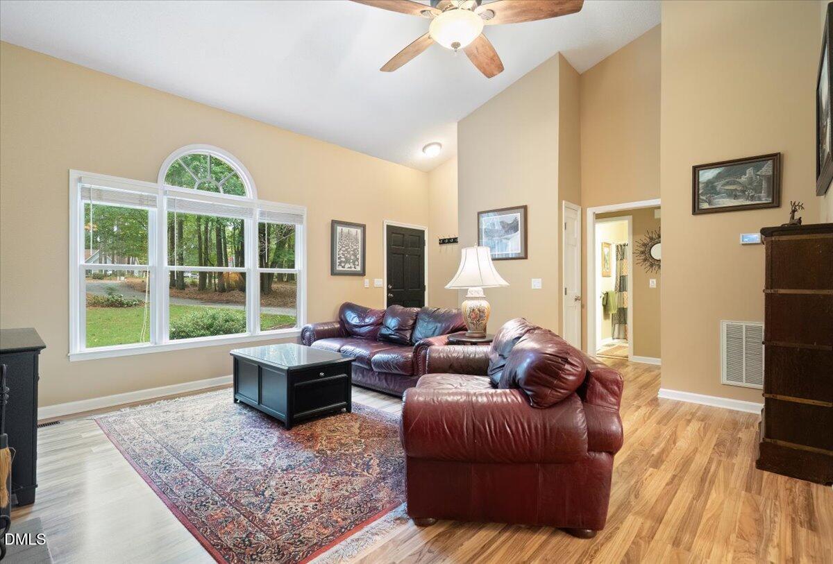 5216 Relay Way Raleigh, NC 27603 - Photo 4 of 27 a living room with furniture windows and wooden floor