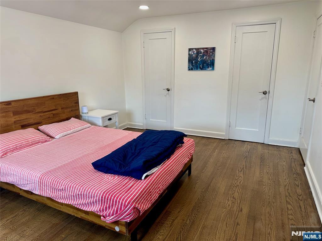 440 Bogert Road River Edge, NJ 07661 - Photo 19 of 25 a bedroom with a bed and wooden floor
