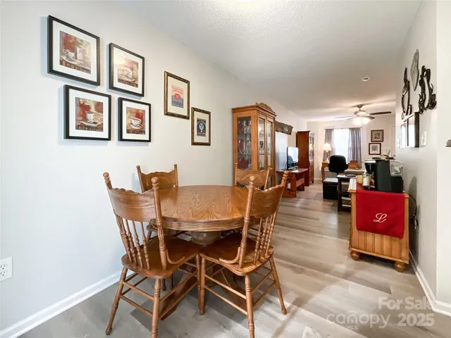 a view of a dining room with furniture