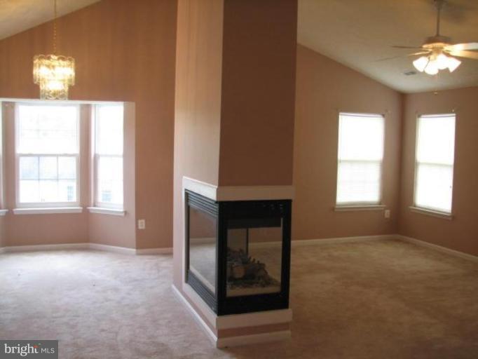 6320 Scaggs Road Owings, MD 20736 - Photo 4 of 4 a view of an empty room with a window