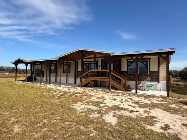 a house view with a outdoor space