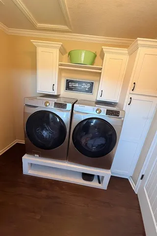 a utility room with dryer and washer