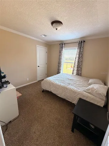a bathroom with a tub and a shower
