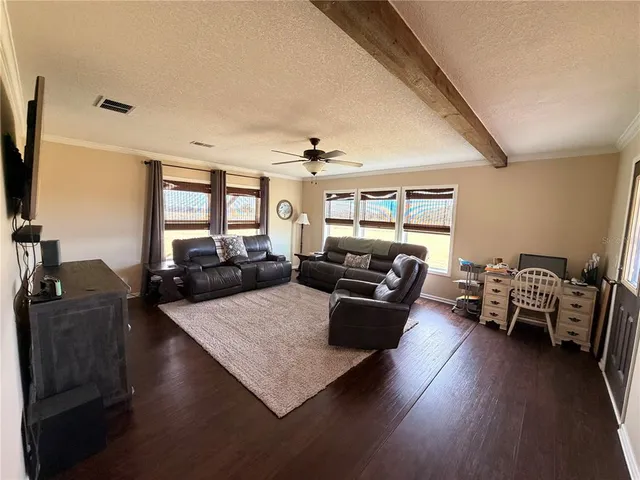 a view of a balcony with chairs