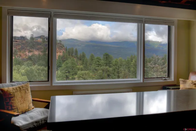 a picture of a bench in a window