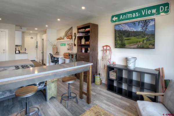 a view of a living room and dining room