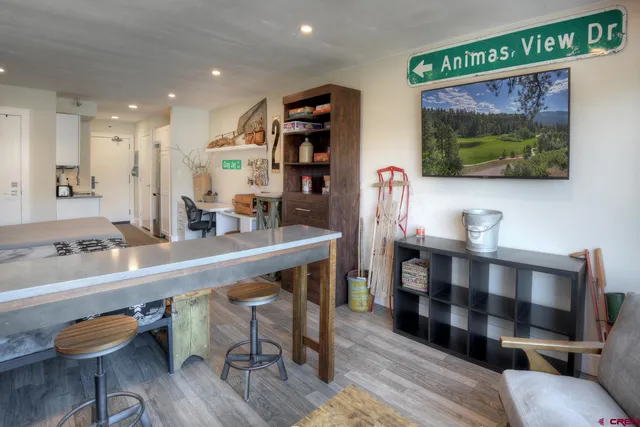 a view of a living room and dining room