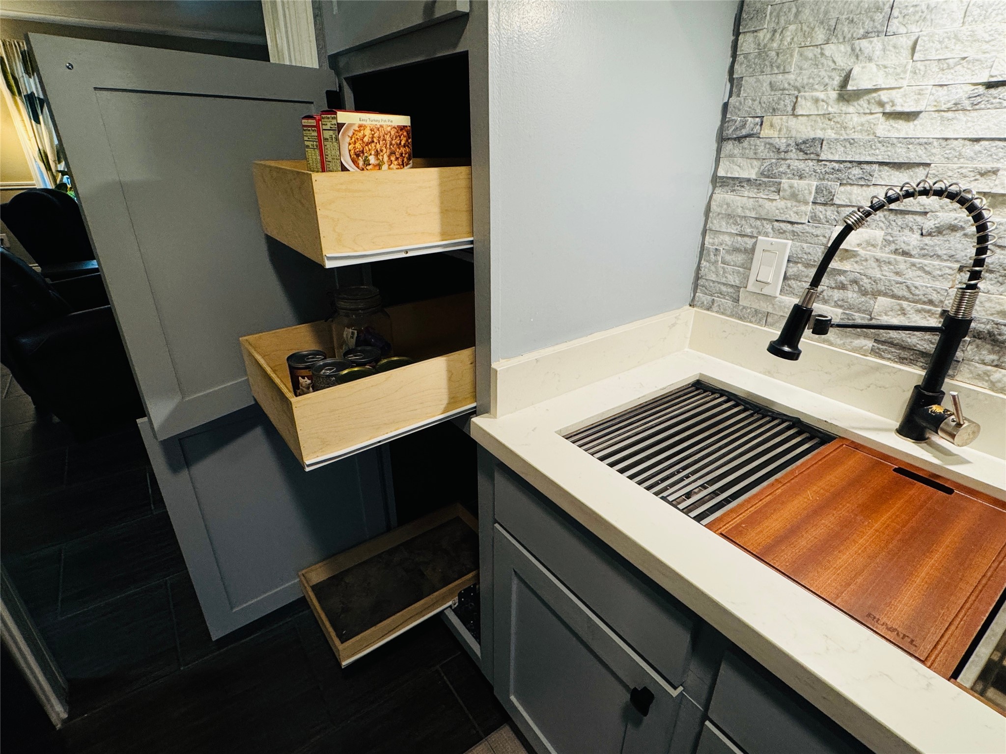 5800 Lumberdale Road, Unit 90 Houston, TX 77092 - Photo 23 of 39 Many of the cabinets have pull-outs.