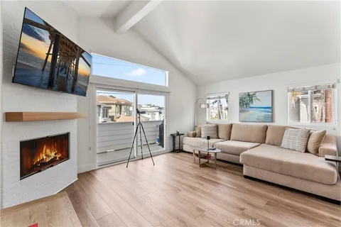 a view of a dining table and chairs in the balcony