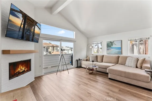 a view of a dining table and chairs in the balcony