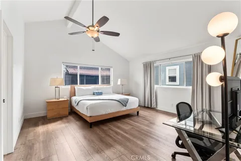 a bathroom with a sink toilet a mirror and shower