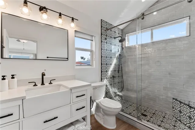 a living room with furniture and a lamp