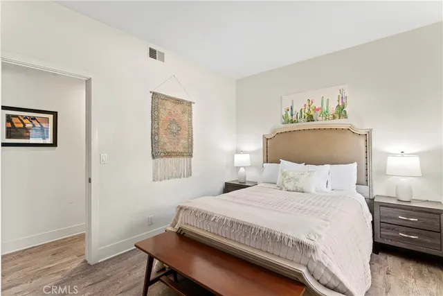 an aerial view of a house with swimming pool and outdoor seating
