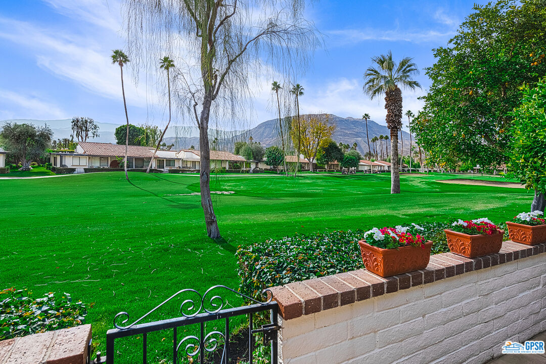 75 Durango Circle Rancho Mirage, CA 92270 - Photo 24 of 37 a garden view with a seating space