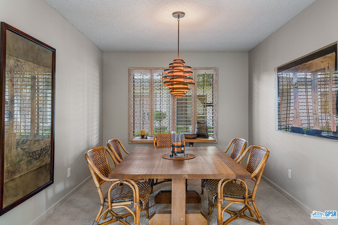 75 Durango Circle Rancho Mirage, CA 92270 - Photo 7 of 37 a view of a dining room with furniture window and outside view