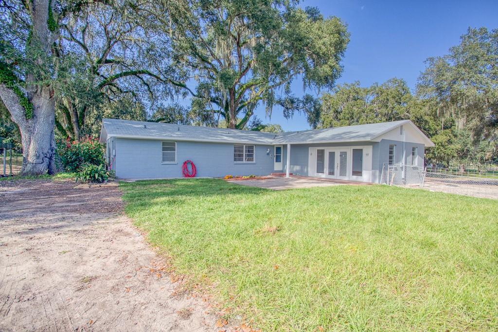 7001 Simons Road Zephyrhills, FL 33541 - Photo 1 of 1 FRONT of house on 1 acre