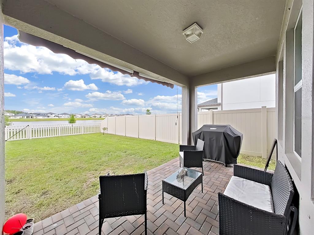 8312 Rolling Tides Drive New Port Richey, FL 34655 - Photo 11 of 49 a view of outdoor space yard and patio