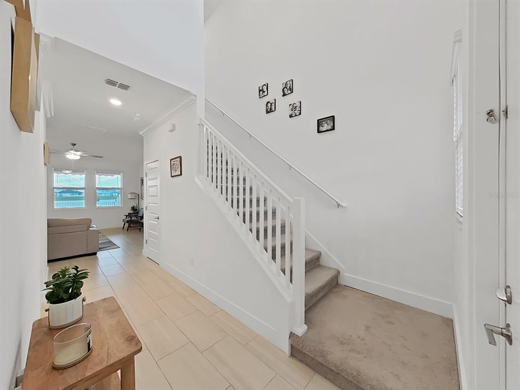 8312 Rolling Tides Drive New Port Richey, FL 34655 - Photo 14 of 49 a view of entryway and hall