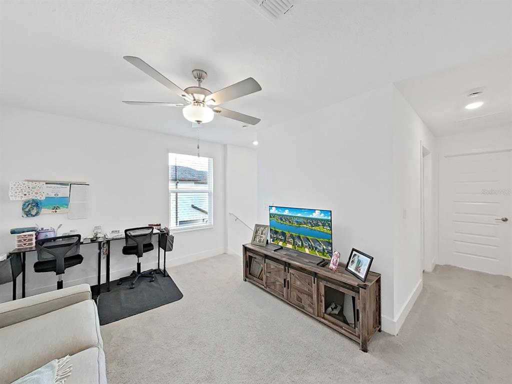 8312 Rolling Tides Drive New Port Richey, FL 34655 - Photo 29 of 49 a living room with furniture