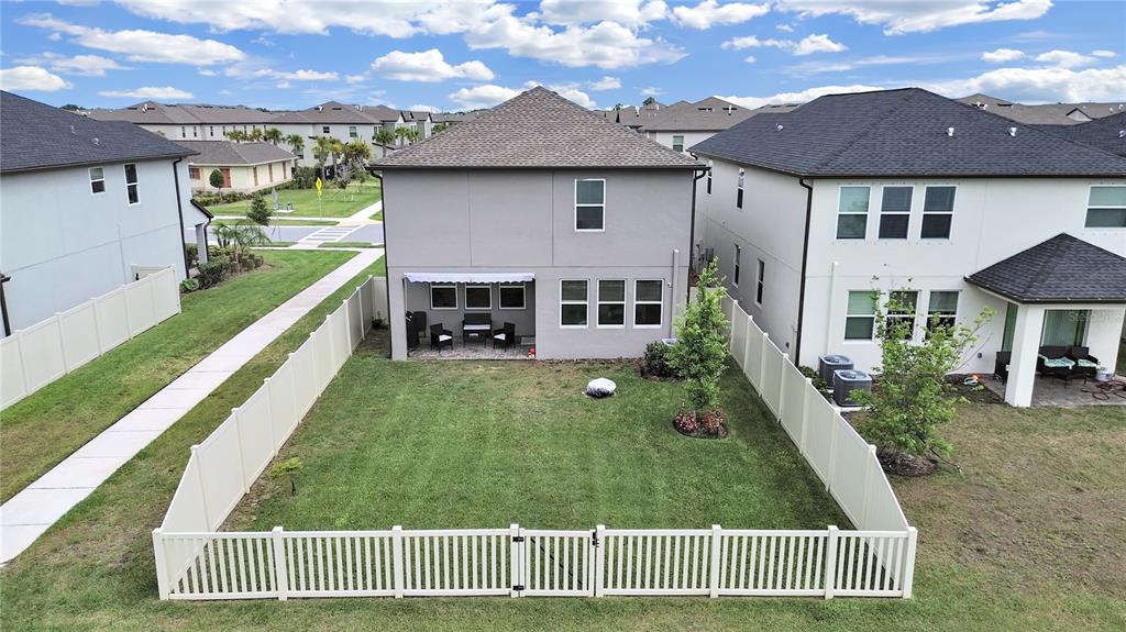 8312 Rolling Tides Drive New Port Richey, FL 34655 - Photo 3 of 49 a front view of a house with a yard