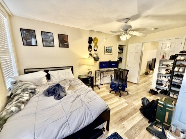 14 Cleveland Place, Unit 2 Boston, MA 02113 - Photo 15 of 18 a bedroom with a bed and wooden floor