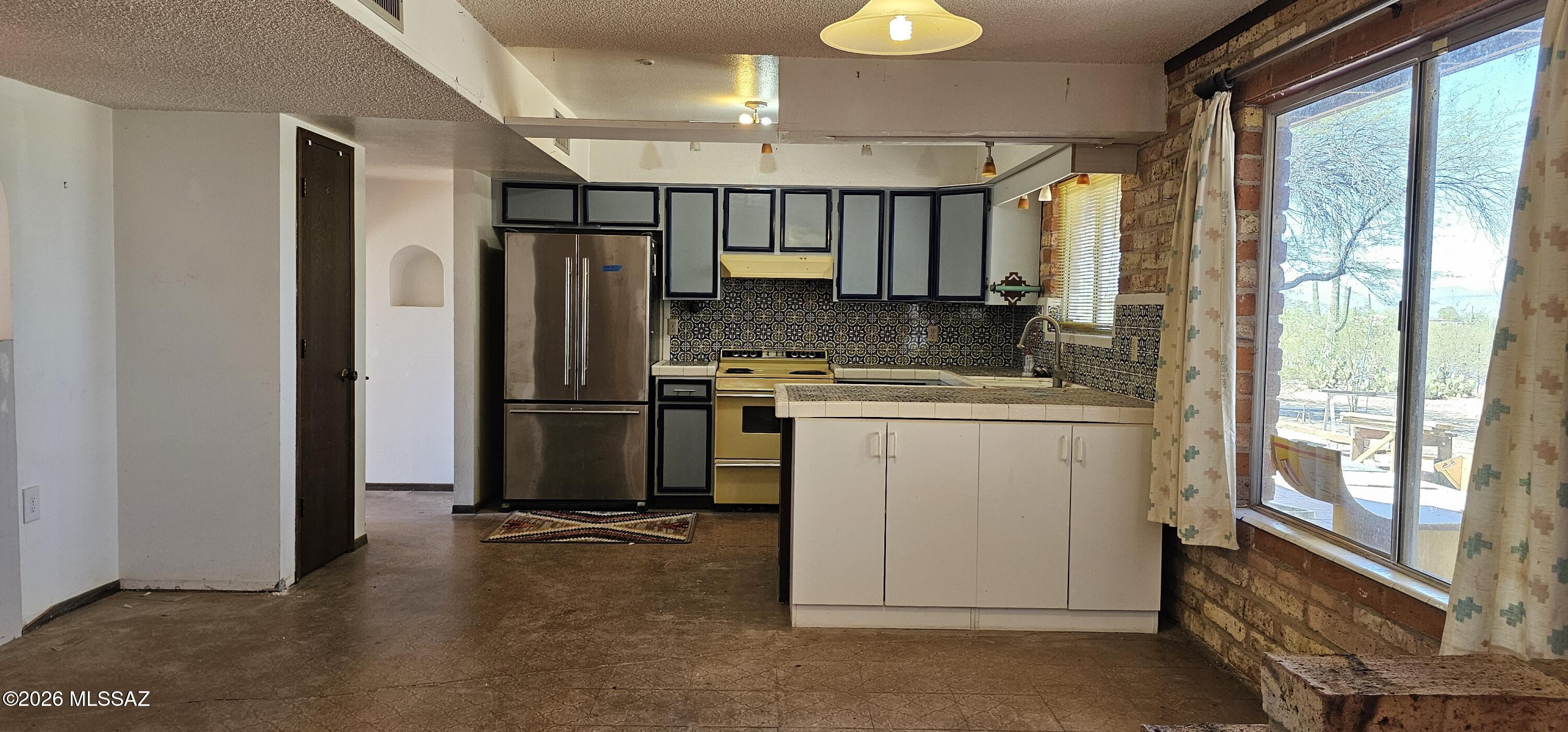 4441 North Sanders Road Tucson, AZ 85743 - Photo 10 of 40 Kitchen-angle4