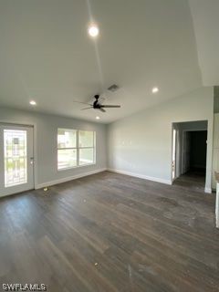 630 Royce Road LaBelle, FL 33935 - Photo 5 of 9 an empty room with wooden floor and windows