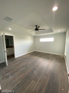 630 Royce Road LaBelle, FL 33935 - Photo 7 of 9 an empty room with wooden floor and windows