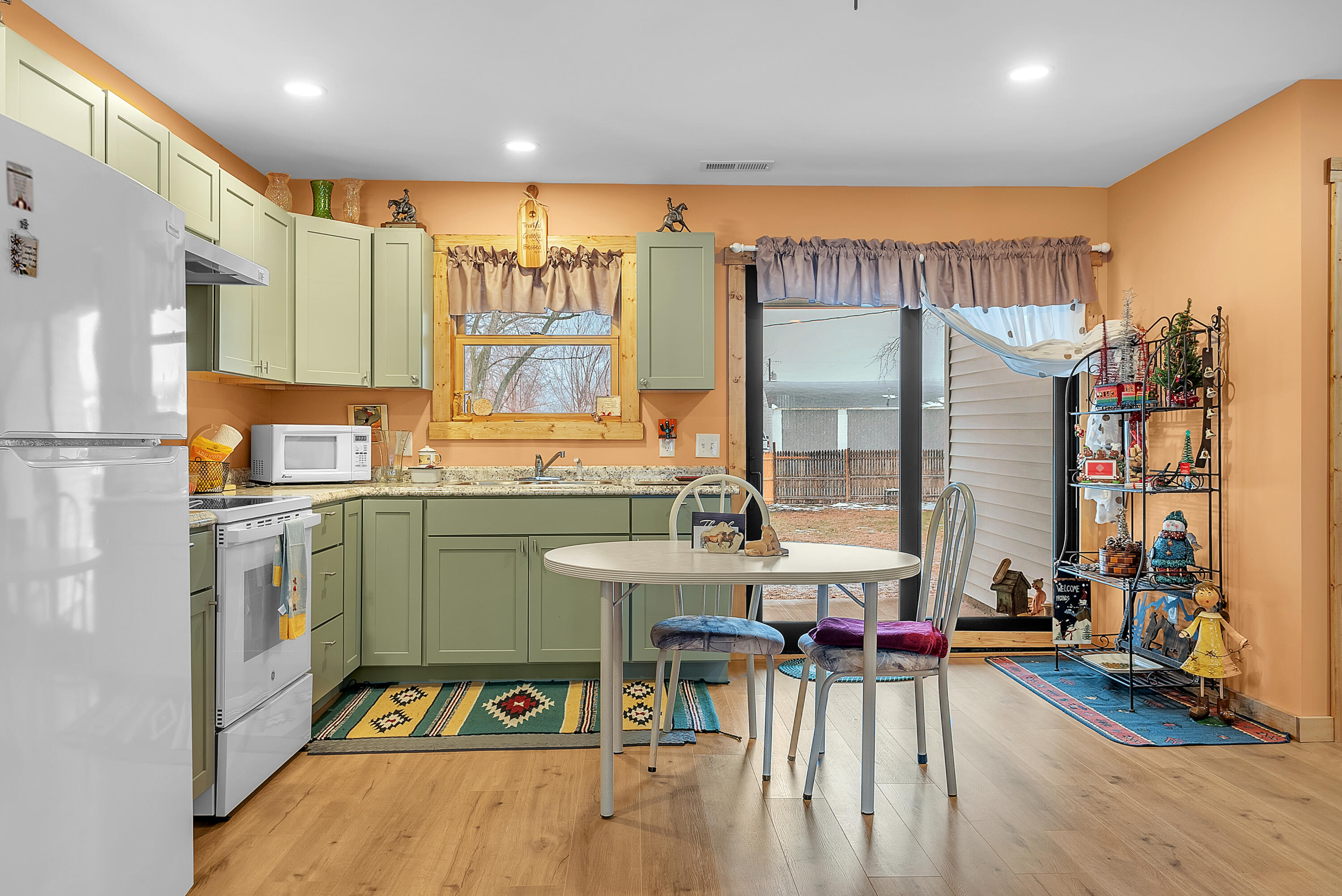 25 East Grove Street Wheatfield, IN 46392 - Photo 11 of 18 a very nice looking kitchen with a large window