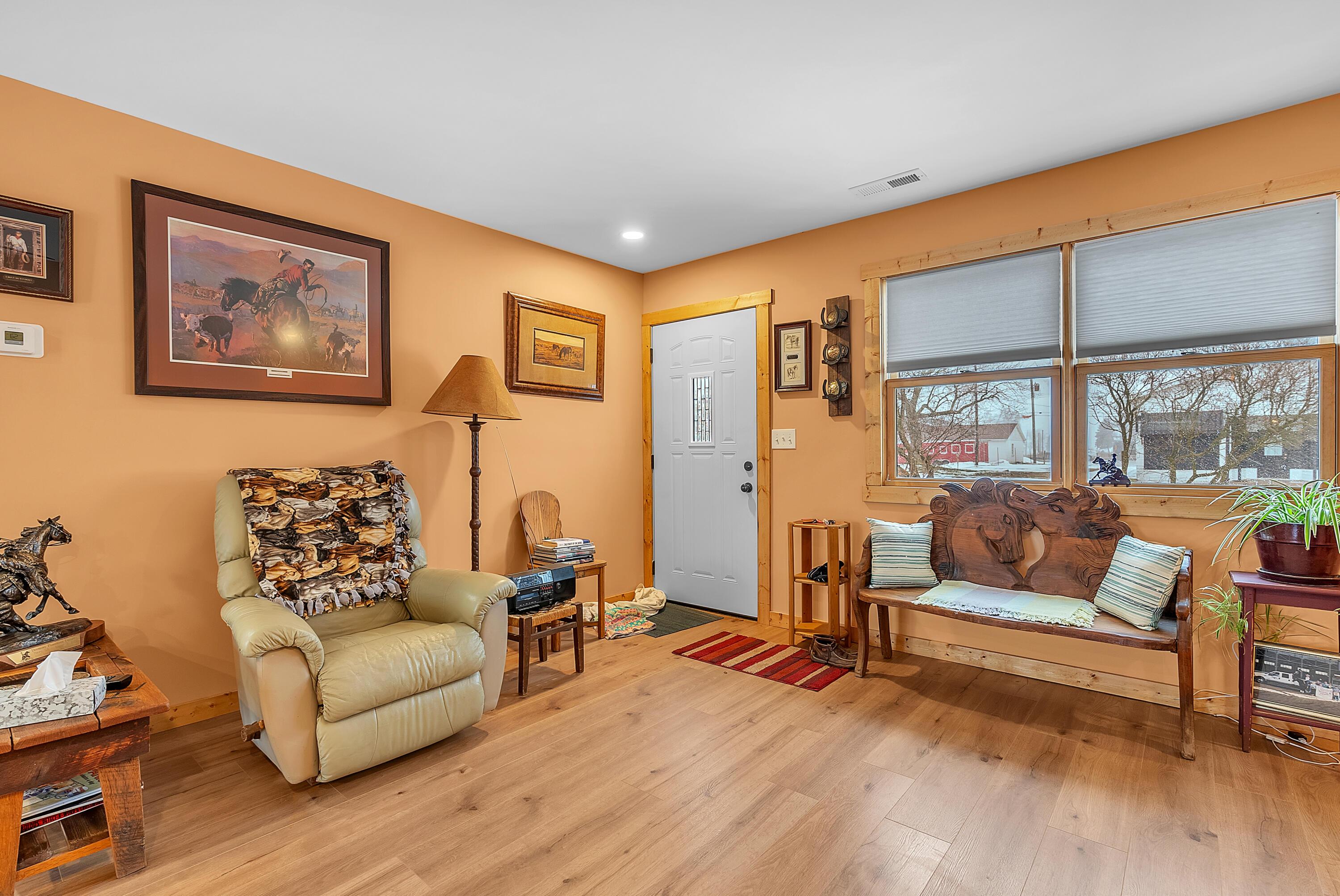 25 East Grove Street Wheatfield, IN 46392 - Photo 12 of 18 a living room with furniture and a large window