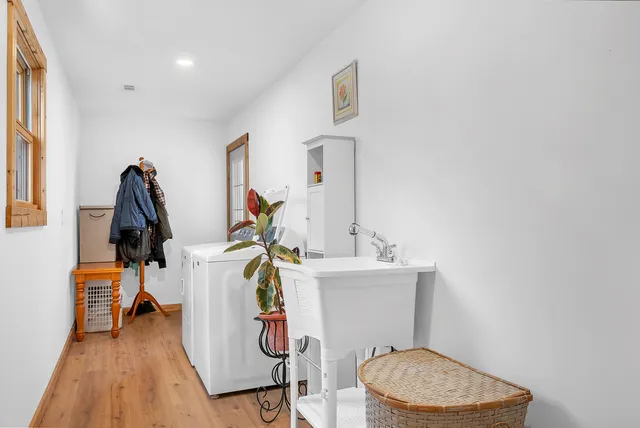 a bathroom with a toilet and a mirror