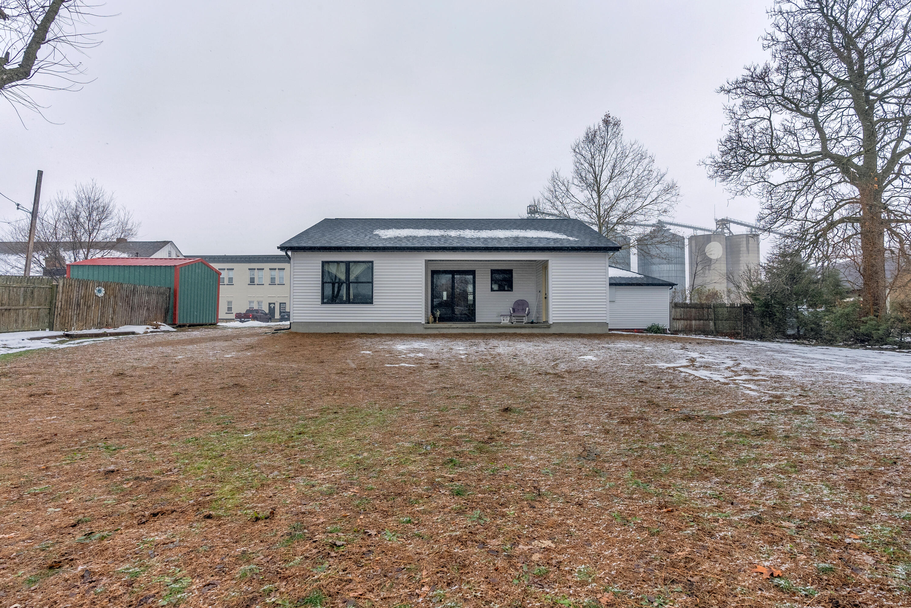 25 East Grove Street Wheatfield, IN 46392 - Photo 5 of 18 a front view of a house with a yard