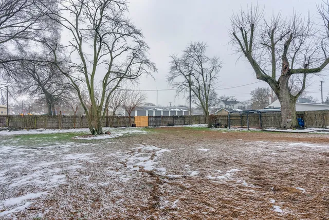 a backyard of a house with lots of green space