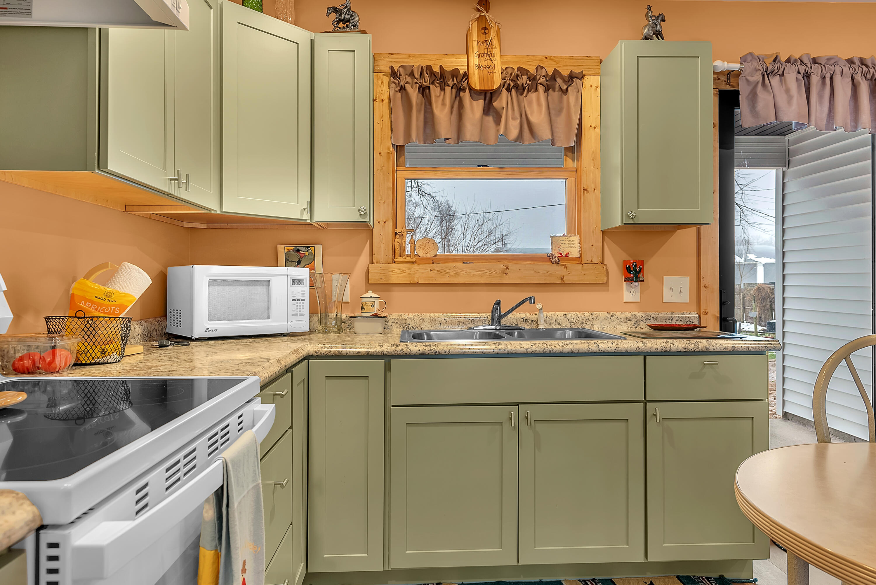 25 East Grove Street Wheatfield, IN 46392 - Photo 9 of 18 a bathroom with a sink and a mirror