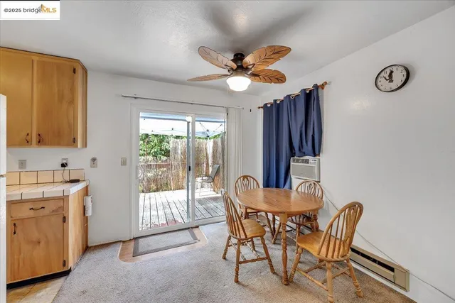 a kitchen with stainless steel appliances granite countertop a stove and a microwave