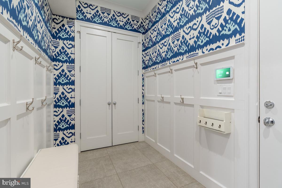 4621 Chestnut Street Bethesda, MD 20814 - Photo 20 of 45 Mudroom adorned with bold ikat wallpaper