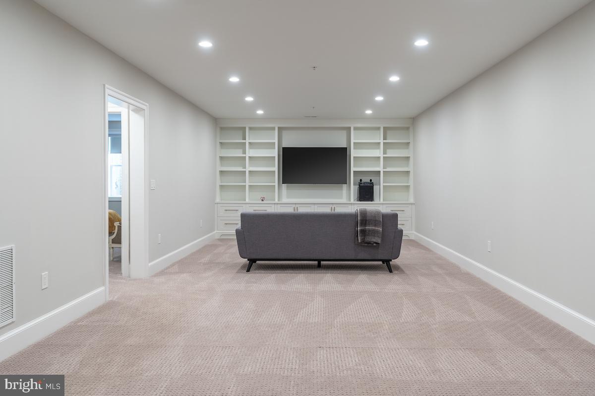 4621 Chestnut Street Bethesda, MD 20814 - Photo 38 of 45 Expansive lower level family room
