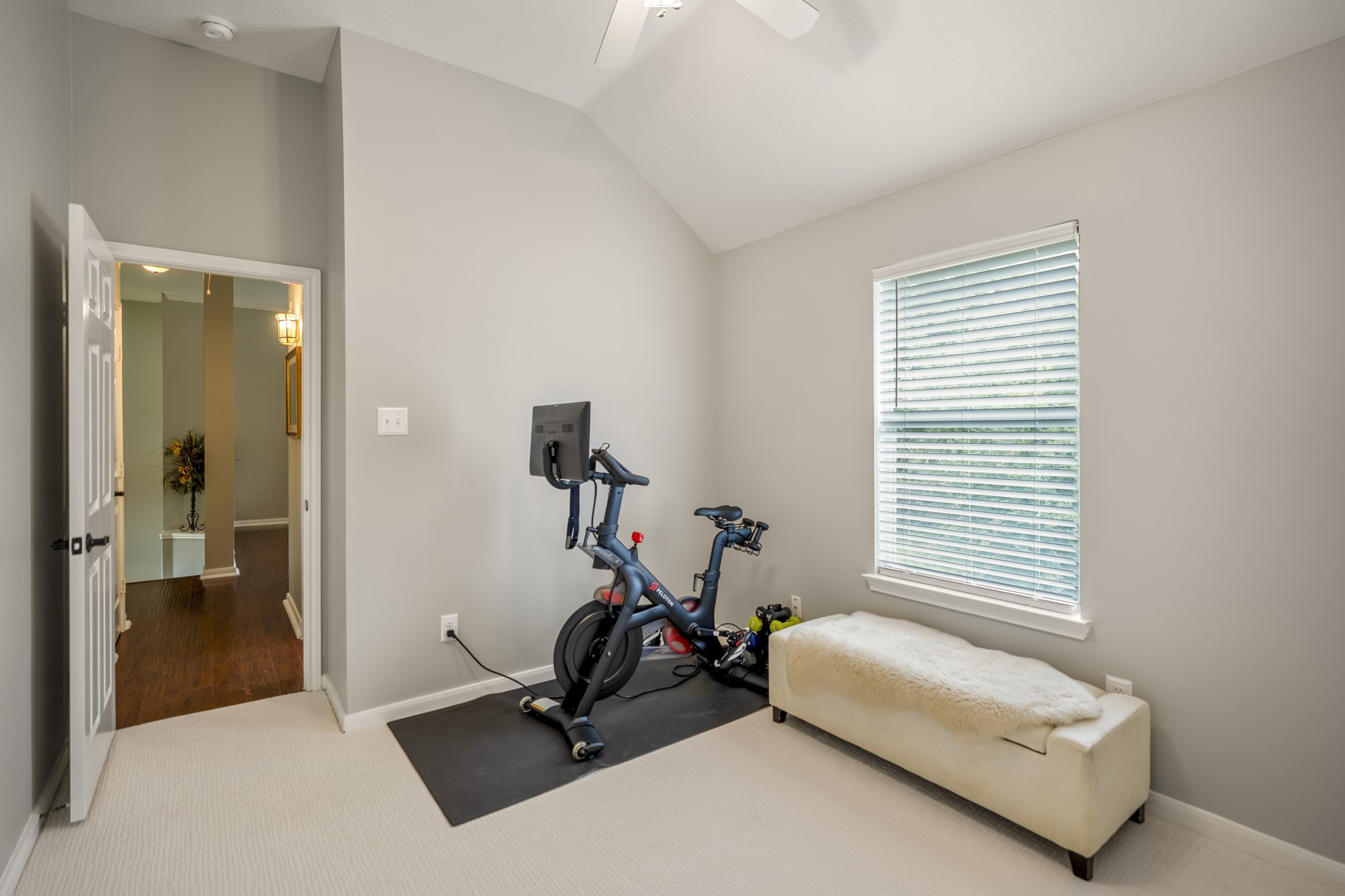 20235 Eden Pines Spring, TX 77379 - Photo 29 of 50 From the opposite side, you get a better sense of the room’s shape and the extra storage just off the third bedroom. With its walk-in closet and carpeted flooring, this room has a slightly different feel from the others upstairs while still keeping the bedrooms grouped around the game room and shared bath.