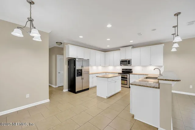 a view of entryway with wooden floor and a window