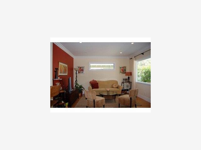 537 View Street Mountain View, CA 94041 - Photo 2 of 9 a living room with furniture and a potted plant