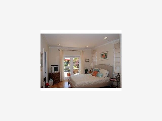 537 View Street Mountain View, CA 94041 - Photo 6 of 9 a living room with furniture and a flat screen tv