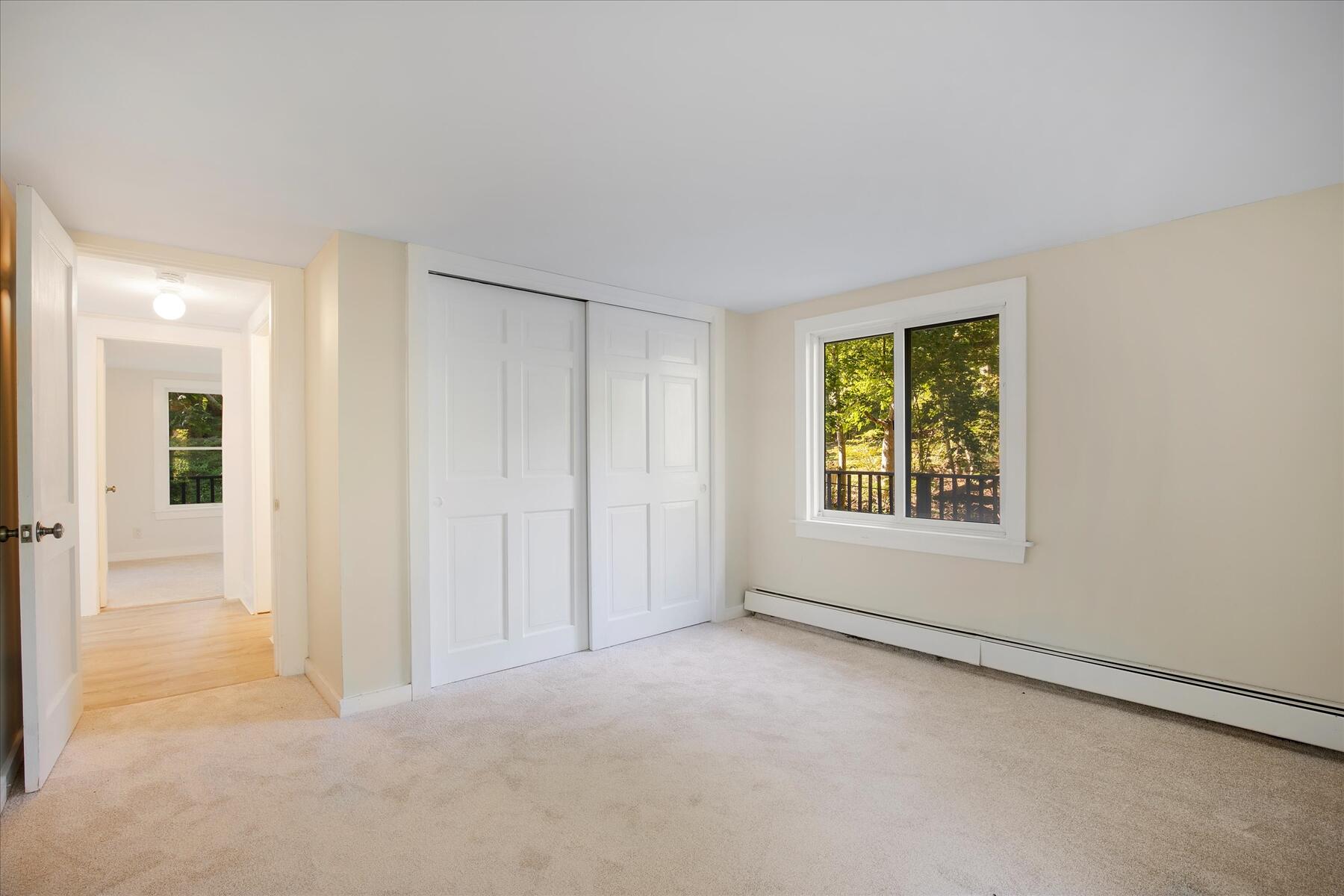 254 Barlows Landing Road Pocasset, MA 02559 - Photo 17 of 27 an empty room with windows