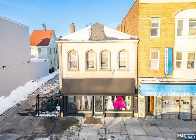 a front view of a multi story residential apartment building