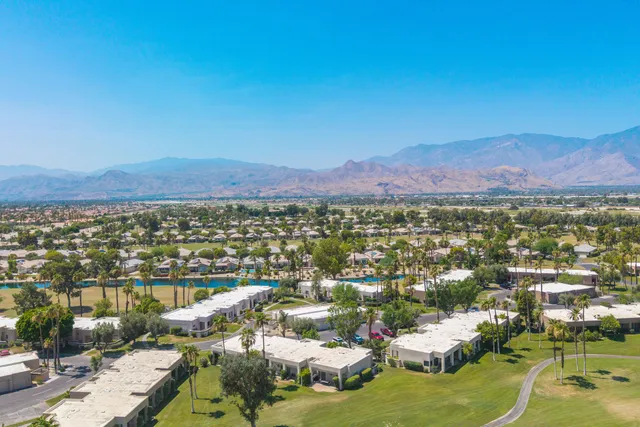 a view of a chair and table in the patio